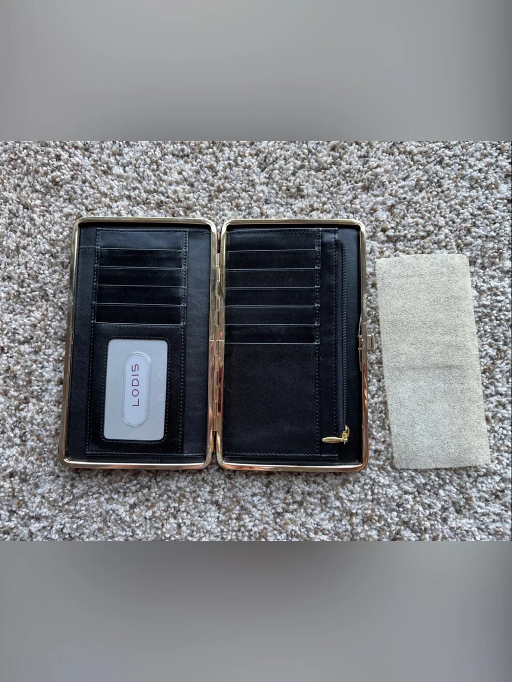 Lodis Black Leather snap wallet.